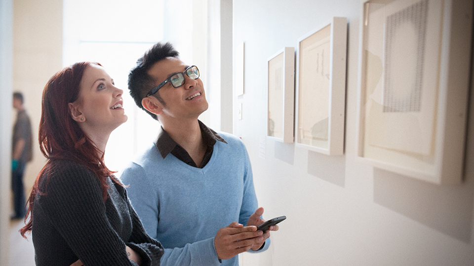 Two people in a museum